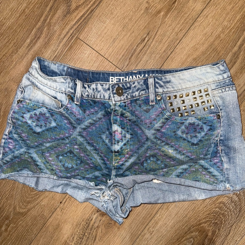 Bethany Mota High Rise Shorty blue jean shorts with an Aztec pattern and studs